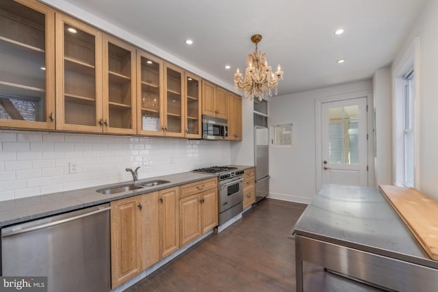 525 Scott St, Baltimore, MD 21230 - kitchen featuring high end appliances, dark wood-type flooring, tasteful backsplash, recessed lighting, and a chandelier