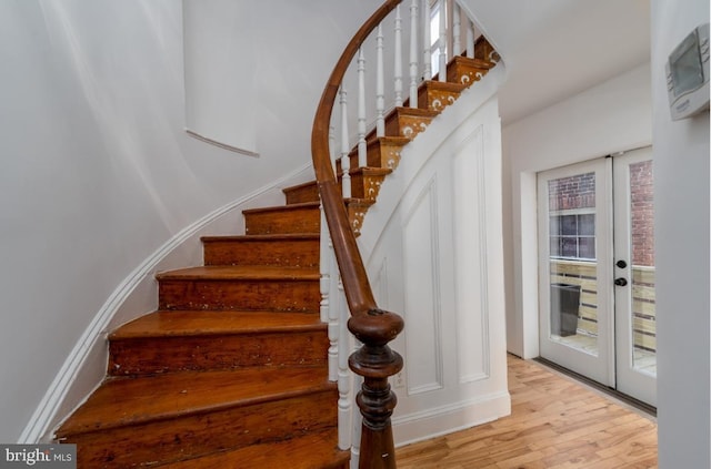 525 Scott St, Baltimore, MD 21230 - stairway featuring wood finished floors and french doors