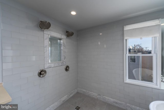 525 Scott St, Baltimore, MD 21230 - bathroom featuring a tile shower, tile patterned flooring, and recessed lighting