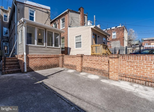 525 Scott St, Baltimore, MD 21230 - view of side of property with a sunroom