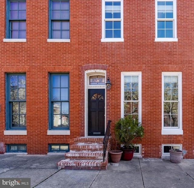 525 Scott St, Baltimore, MD 21230 - doorway to property with brick siding