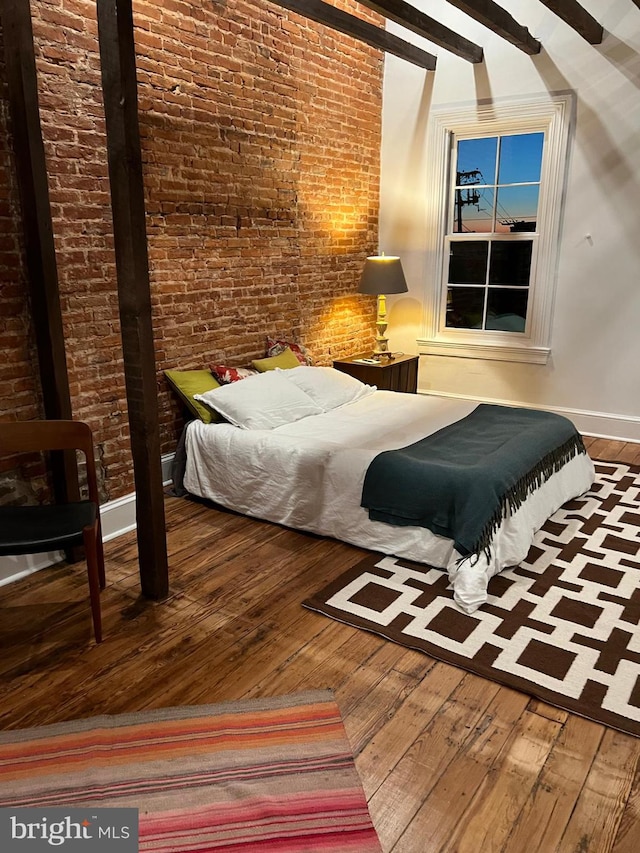 525 Scott St, Baltimore, MD 21230 - bedroom featuring hardwood / wood-style flooring and brick wall