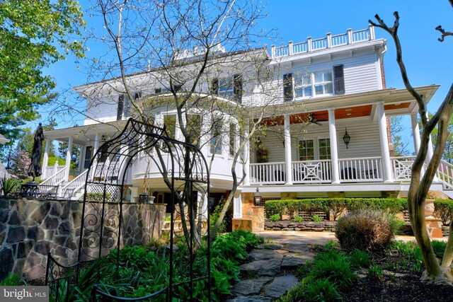 3634 Chain Bridge Rd, Fairfax, VA 22030 - view of front of home featuring a porch, stairs, and a ceiling fan