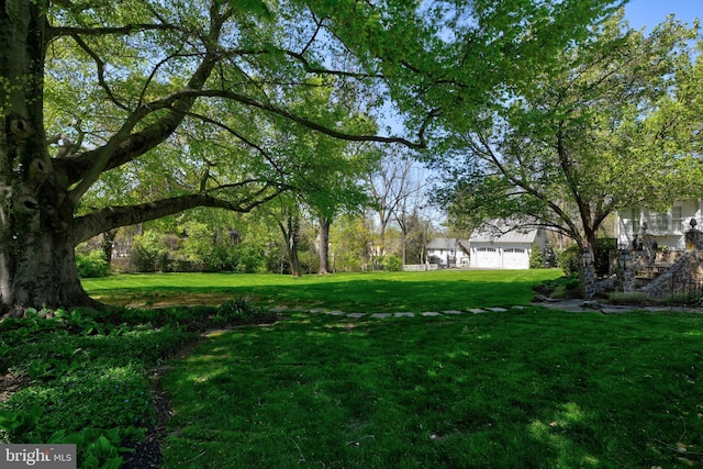 3634 Chain Bridge Rd, Fairfax, VA 22030 - view of green lawn with a garage