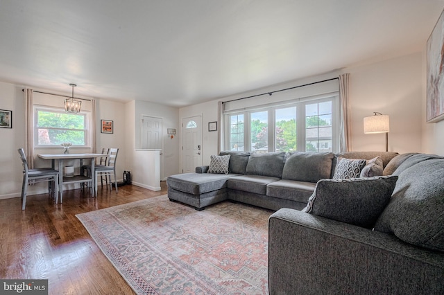 2811 Green St, Claymont, DE 19703 - living area with dark wood finished floors and baseboards
