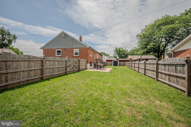 2811 Green St, Claymont, DE 19703 - fenced backyard with a storage shed and a patio
