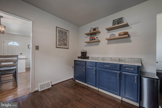 2811 Green St, Claymont, DE 19703 - bar area featuring dark wood-style flooring and a chandelier