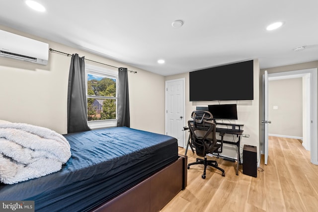 510 Sutherland Rd, Ewing, NJ 08618 - bedroom featuring a wall mounted AC, light wood finished floors, recessed lighting, and a desk