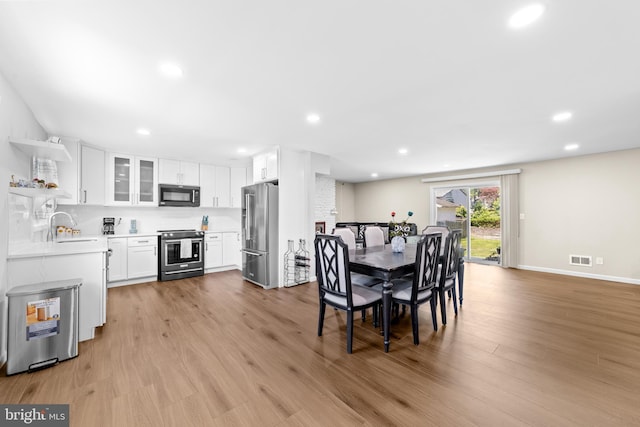 510 Sutherland Rd, Ewing, NJ 08618 - dining space featuring recessed lighting and light wood finished floors