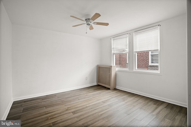 7019 Algard St, Philadelphia, PA 19135 - spare room featuring wood finished floors and a ceiling fan