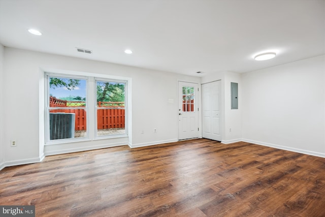 24 Whitechurch Ct, Germantown, MD 20874 - spare room featuring electric panel, plenty of natural light, wood finished floors, and recessed lighting