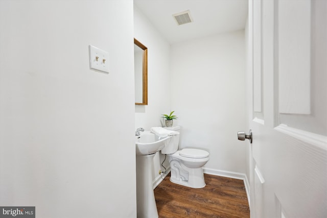 24 Whitechurch Ct, Germantown, MD 20874 - bathroom with wood finished floors and toilet