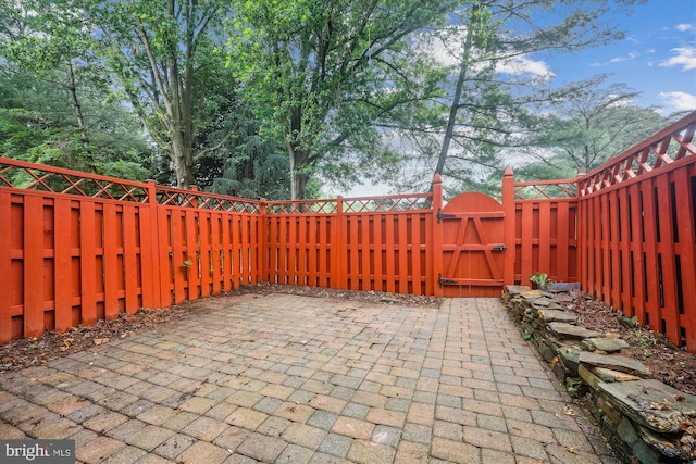 24 Whitechurch Ct, Germantown, MD 20874 - fenced backyard with a gate and a patio