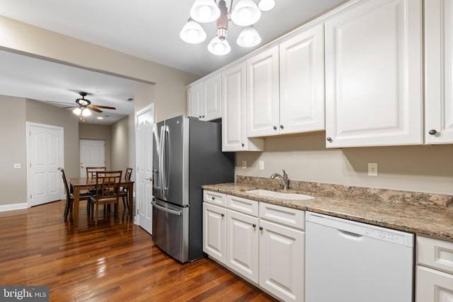 1324 W Chester Pike Unit 105, West Chester, PA 19382 - kitchen featuring white dishwasher, stainless steel fridge, white cabinetry, ceiling fan, and dark wood-type flooring