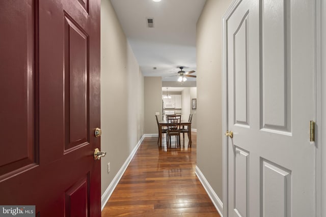 1324 W Chester Pike Unit 105, West Chester, PA 19382 - hallway with dark wood-type flooring and baseboards