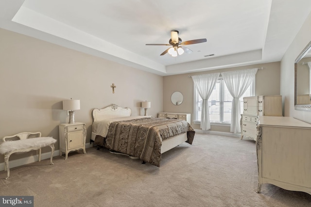 1324 W Chester Pike Unit 105, West Chester, PA 19382 - bedroom with a raised ceiling, light colored carpet, and a ceiling fan