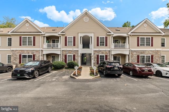1324 W Chester Pike Unit 105, West Chester, PA 19382 - townhome / multi-family property with uncovered parking and stone siding