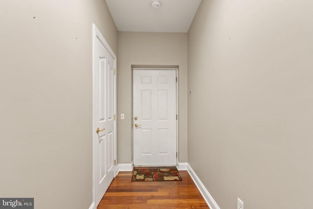 1324 W Chester Pike Unit 105, West Chester, PA 19382 - doorway to outside with wood finished floors and baseboards