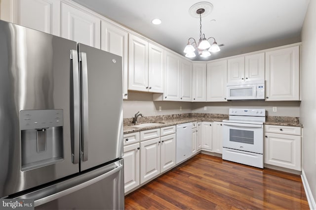 1324 W Chester Pike Unit 105, West Chester, PA 19382 - kitchen featuring white appliances, white cabinets, a chandelier, pendant lighting, and recessed lighting