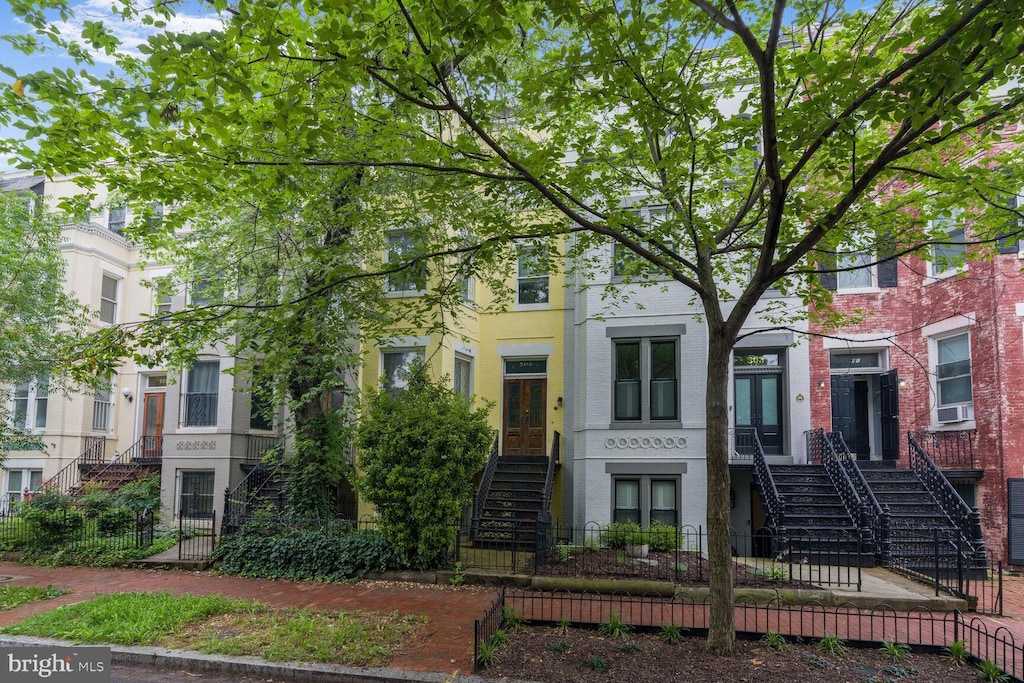 505 Constitution Ave NE, Washington, DC 20002 - view of property featuring stairs, a fenced front yard, and french doors