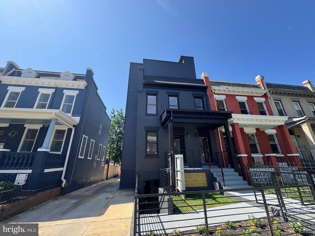 616 NW Kenyon St NW, Washington, DC 20010 - multi unit property featuring a fenced front yard