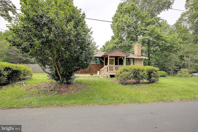 638 Los Alamos Ln, Lusby, MD 20657 - view of front facade with a chimney