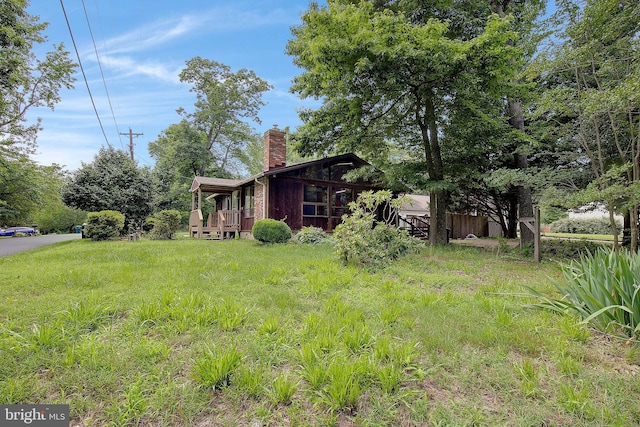 638 Los Alamos Ln, Lusby, MD 20657 - view of yard with a deck