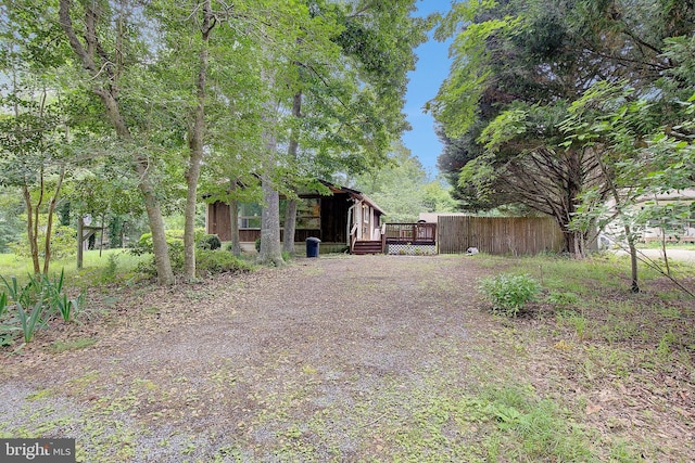 638 Los Alamos Ln, Lusby, MD 20657 - view of yard featuring a deck