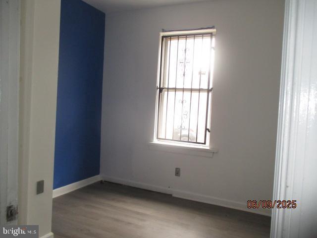 1142 W Nevada St, Philadelphia, PA 19133 - spare room with wood finished floors and baseboards