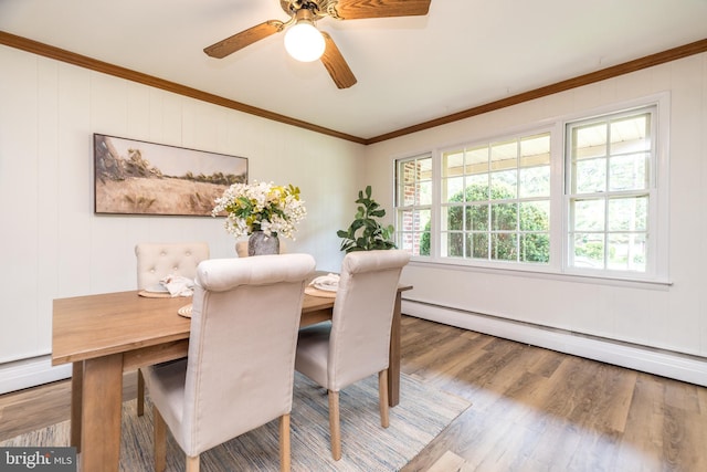 559 Maple Ave, Doylestown, PA 18901 - dining area with wood finished floors, ornamental molding, a baseboard radiator, and ceiling fan