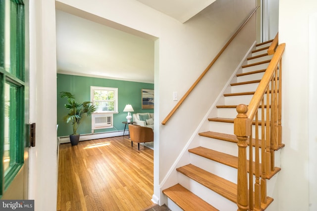559 Maple Ave, Doylestown, PA 18901 - stairs with baseboard heating, hardwood / wood-style floors, and an AC wall unit