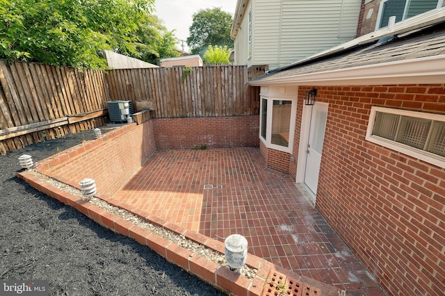 4220 Fort Dupont St SE, Washington, DC 20020 - fenced backyard featuring a patio area