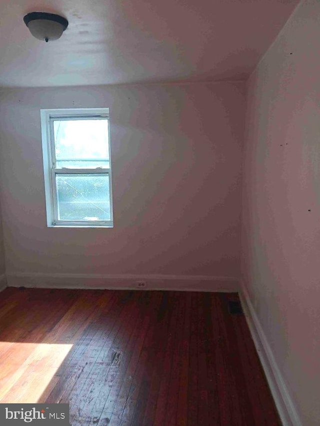 509 N Highland Ave, Baltimore, MD 21205 - unfurnished room featuring hardwood / wood-style flooring and baseboards