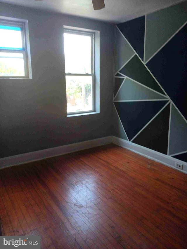 509 N Highland Ave, Baltimore, MD 21205 - spare room with hardwood / wood-style floors and baseboards
