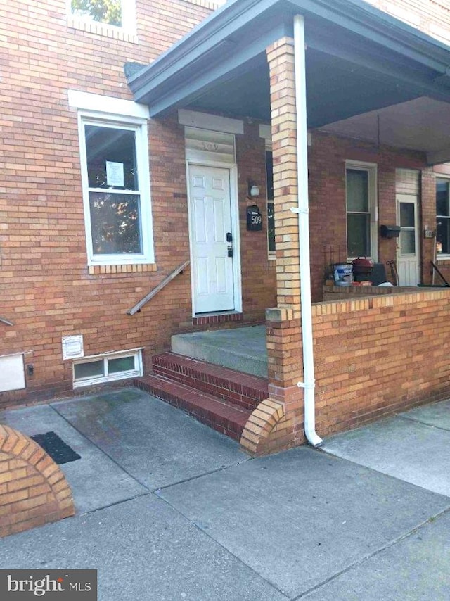 509 N Highland Ave, Baltimore, MD 21205 - entrance to property featuring brick siding