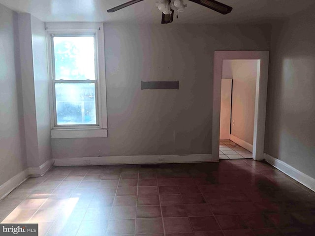 509 N Highland Ave, Baltimore, MD 21205 - tiled empty room featuring healthy amount of natural light and ceiling fan