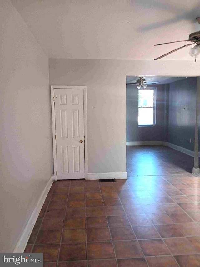 509 N Highland Ave, Baltimore, MD 21205 - unfurnished room featuring a ceiling fan and tile patterned flooring