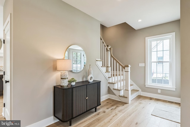 45 Orchard Ln, Berwyn, PA 19312 - entryway with healthy amount of natural light, wood finished floors, stairway, and recessed lighting