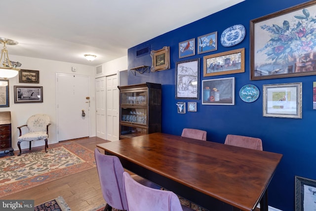 1610 The Fairway Unit 404-W, Jenkintown, PA 19046 - dining space featuring wood finished floors and baseboards