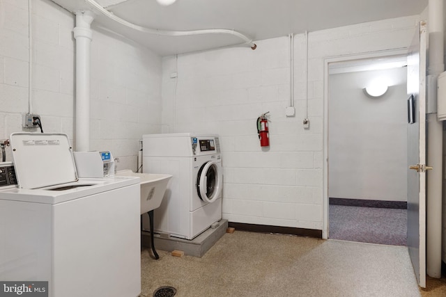 1610 The Fairway Unit 404-W, Jenkintown, PA 19046 - shared laundry room featuring washing machine and dryer and concrete block wall