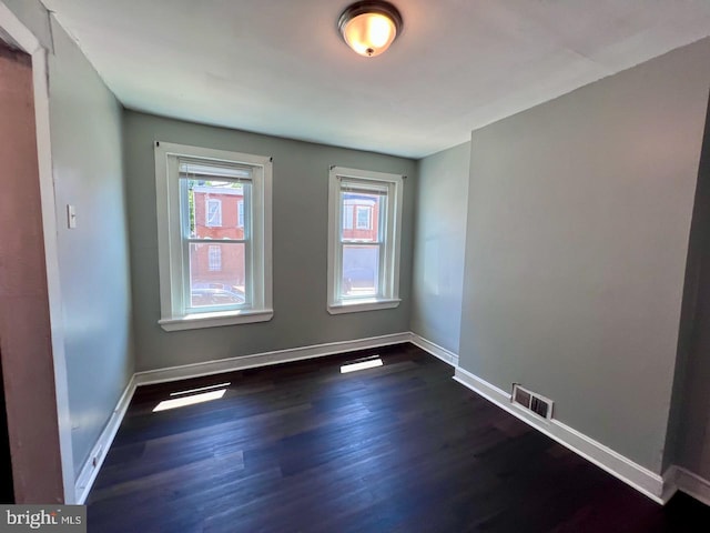 305 Delamore Pl, Wilmington, DE 19805 - spare room with dark wood finished floors and baseboards