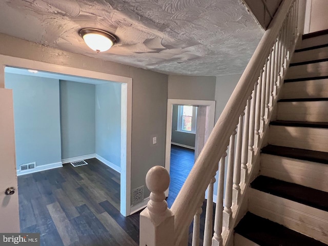 305 Delamore Pl, Wilmington, DE 19805 - staircase with wood finished floors and baseboards