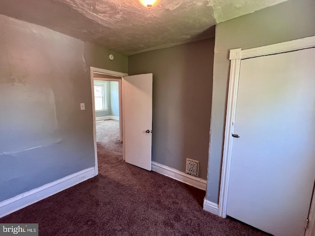 305 Delamore Pl, Wilmington, DE 19805 - empty room with carpet flooring and a textured ceiling