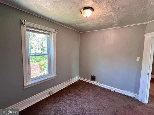 305 Delamore Pl, Wilmington, DE 19805 - unfurnished room featuring a textured ceiling, carpet flooring, and ornamental molding