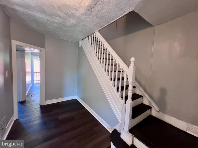 305 Delamore Pl, Wilmington, DE 19805 - stairs featuring wood finished floors and baseboards