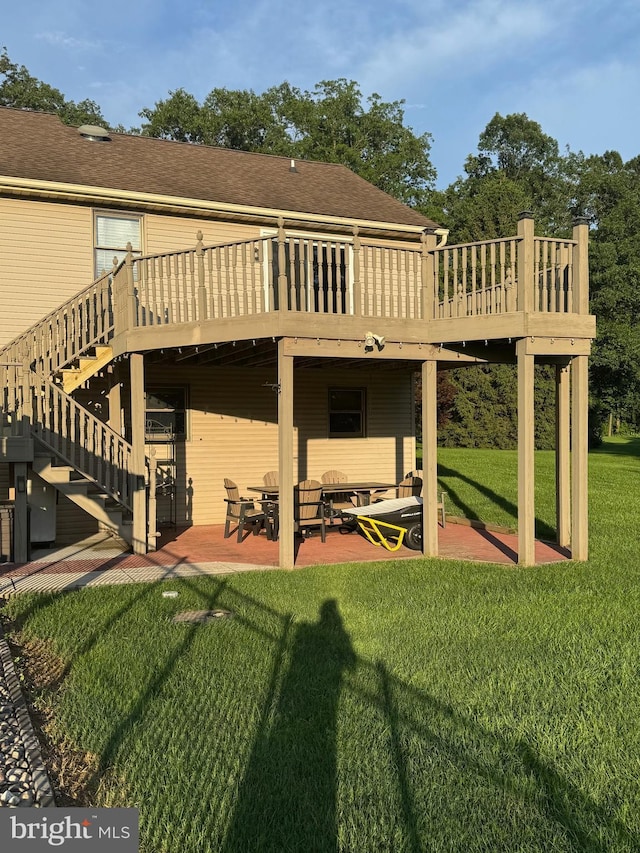 1872 Yingling Dr, Spring Grove, PA 17362 - rear view of property with a patio, a deck, stairway, a yard, and roof with shingles