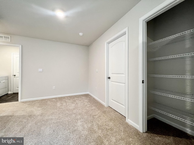 22189 Shorebird Way, Millsboro, DE 19966 - unfurnished bedroom with carpet flooring and baseboards
