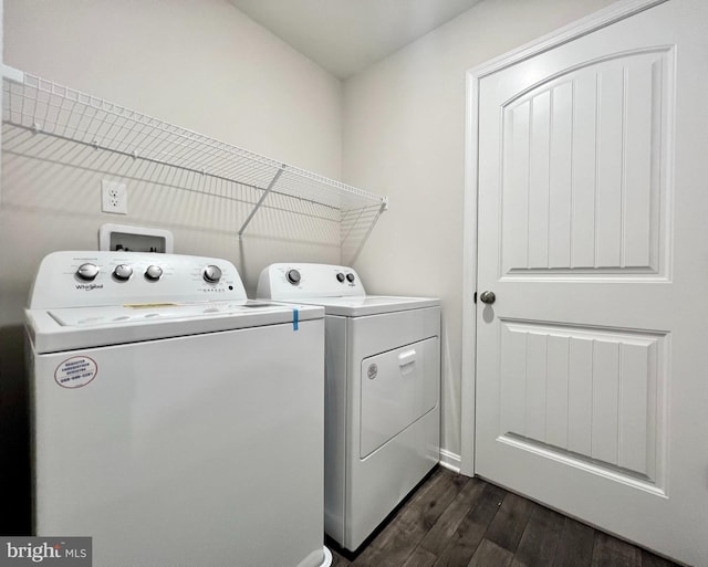 22189 Shorebird Way, Millsboro, DE 19966 - laundry room featuring independent washer and dryer and dark wood finished floors