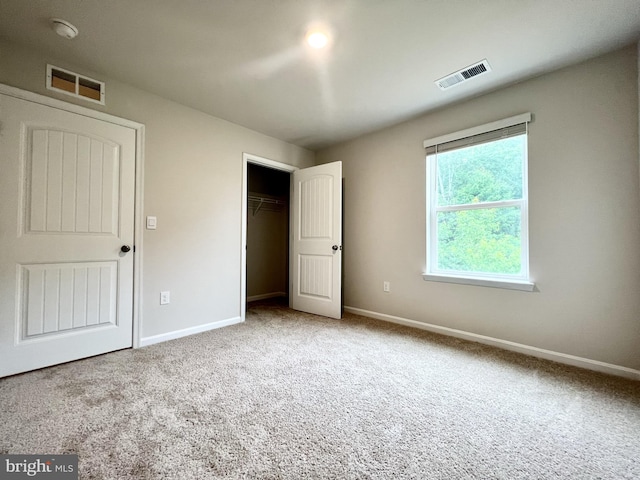 22189 Shorebird Way, Millsboro, DE 19966 - unfurnished bedroom with light carpet and a closet