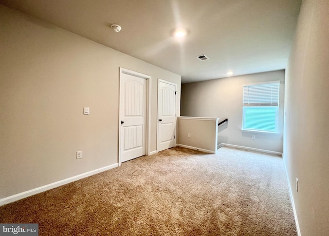 22189 Shorebird Way, Millsboro, DE 19966 - carpeted empty room featuring a smoke detector and baseboards